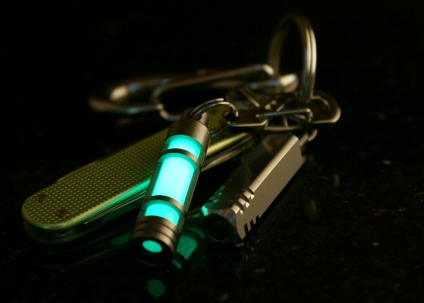 TEC Accessories Embrite Glow Fob - Titanium, Green Embrite Pellet - Glow in the Dark Keychain Accessories - Everyday Carry Key Fob Keychain for Indoor and Outdoor Use, Green, 0.38 x 0.38 x 1.75 inches